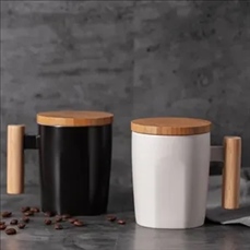 Ceramic coffee cup with wooden handle