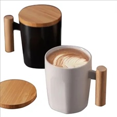 Ceramic coffee cup with wooden handle