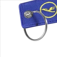 Double sided embroidered keychain