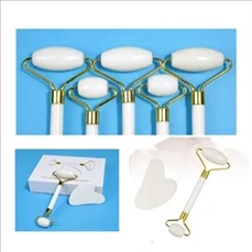 Gift box set with roller guasha board